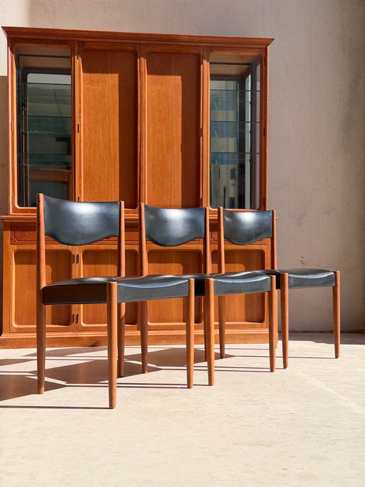 Restored Parker No.62 mid-century modern dining chairs set of 4 showing sleek tapered legs and solid teak timber frame
