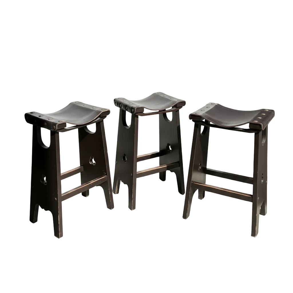 A set of three 1970s Australian Mid-Century Modern Spanish Revival Davis Stools is arranged on a light floor in a sunlit room, with sunlight from the right casting shadows.