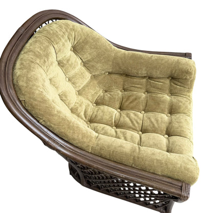 A Vintage Adrian Pearsall Style 1970s Rattan Designer Barrel Chair with an olive green velvet cushion and dark frame, photographed from above on a white background, evokes the comfort and elegance of classic rattan armchairs.