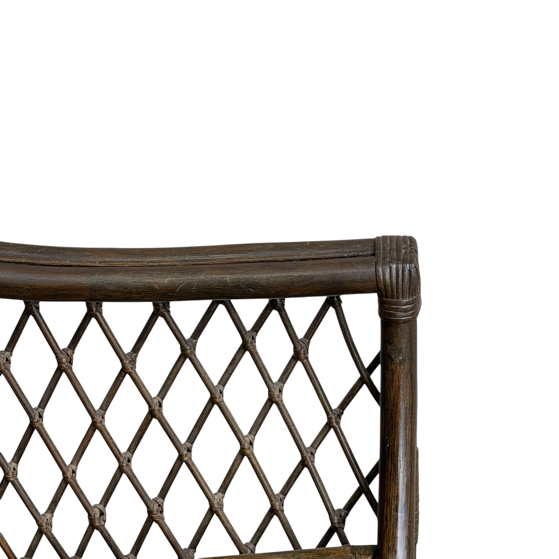 Close-up of the upper corner of a Vintage Adrian Pearsall Style 1970s Rattan Designer Barrel Chair with olive green velvet and a diamond-patterned lattice backrest, set against a plain white background.