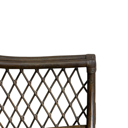 Close-up of the upper corner of a Vintage Adrian Pearsall Style 1970s Rattan Designer Barrel Chair with olive green velvet and a diamond-patterned lattice backrest, set against a plain white background.