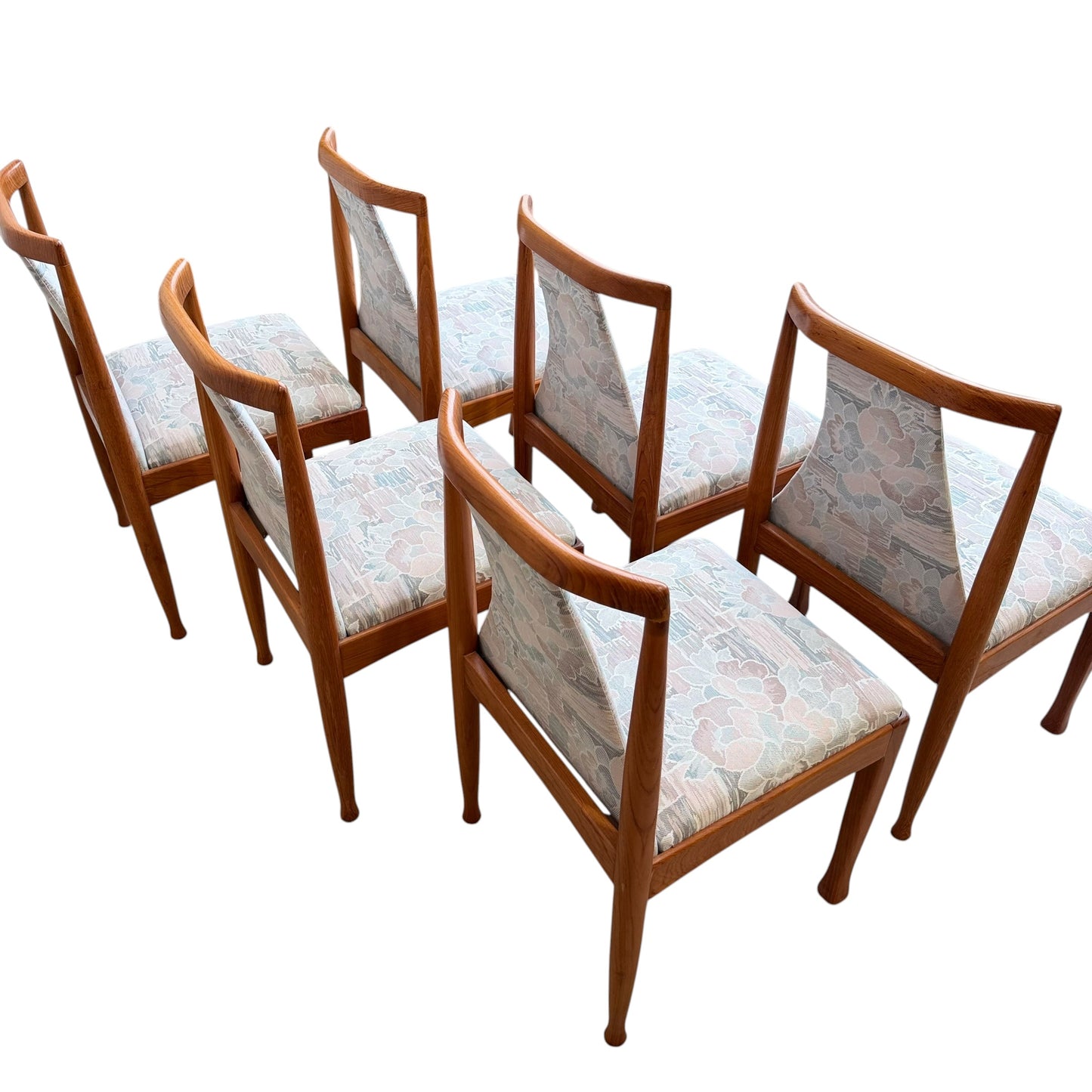 Set of 6 Vintage CRO Teak Dining Chairs (Revive) with light patterned upholstered seats and backs, arranged in two rows on a white background.