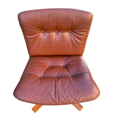 A rare set of 4 vintage Joe Rufenacht lounge chairs in Howe leather, featuring button-tufted backs and seats, wooden legs, and classic Scandinavian design, viewed from above against a white background.