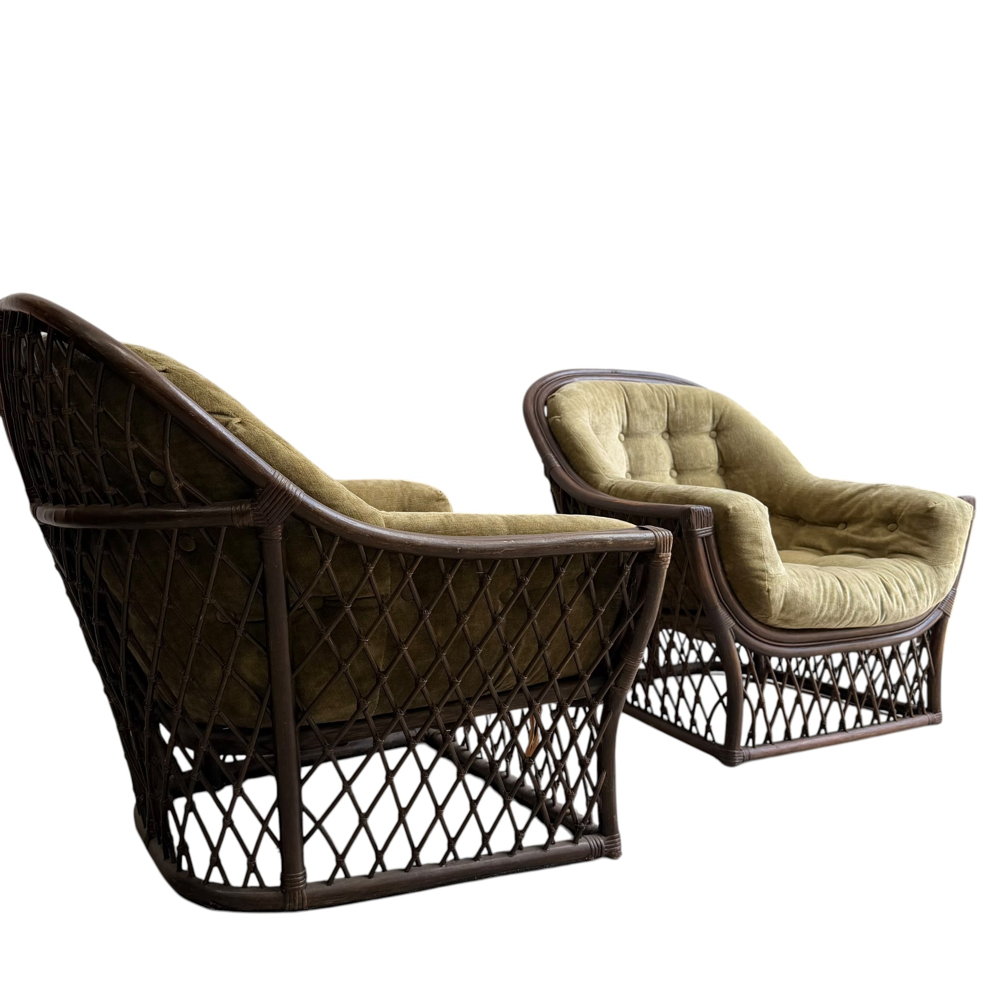 Two Vintage Adrian Pearsall Style 1970s Rattan Designer Barrel Chairs with brown wicker frames and plush olive green velvet cushions are shown side by side on a white background.