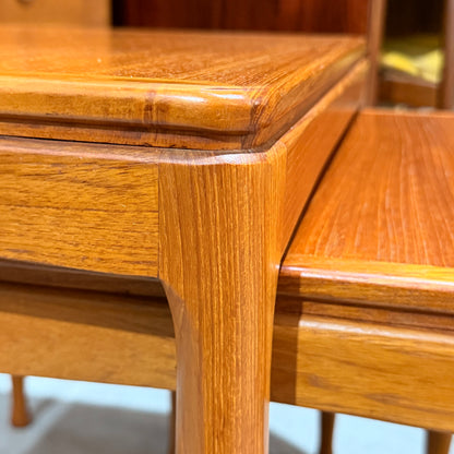 Close-up of the corner and leg of a Rare set of Alpa Teak Nesting Tables – Set of 3, showcasing smooth, polished surfaces and rich wood grain in a warm finish—a true Australian Mid-Century Modern classic.