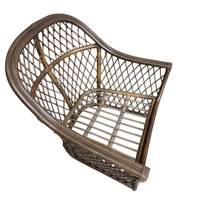 A vintage Adrian Pearsall style 1970s rattan barrel chair with olive green velvet seat, featuring a curved back and open lattice design, is viewed from above at an angle on a white background.