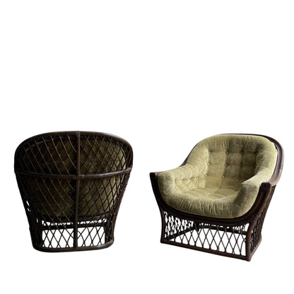 A pair of Vintage Adrian Pearsall Style 1970s Rattan Designer Barrel Chairs with olive green velvet cushions, featuring open-weave frames and rounded, cozy designs—one shown from the back, one from the front.