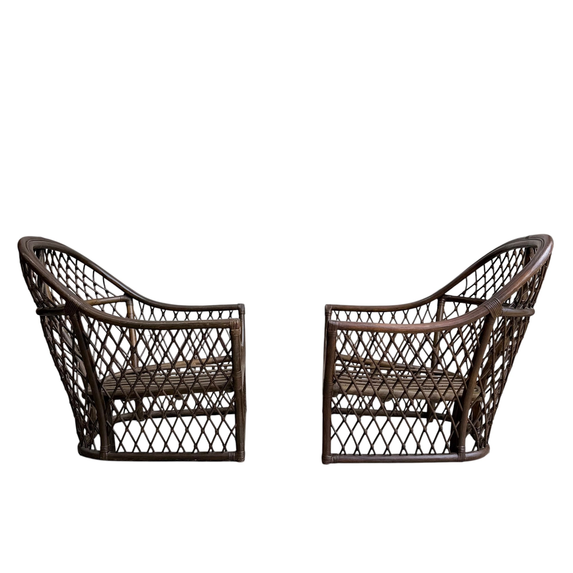 A pair of Vintage Adrian Pearsall Style 1970s Rattan Designer Barrel Chairs in olive green velvet, featuring open lattice sides and backs, are arranged facing each other against a white backdrop, showcasing timeless mid-century design.