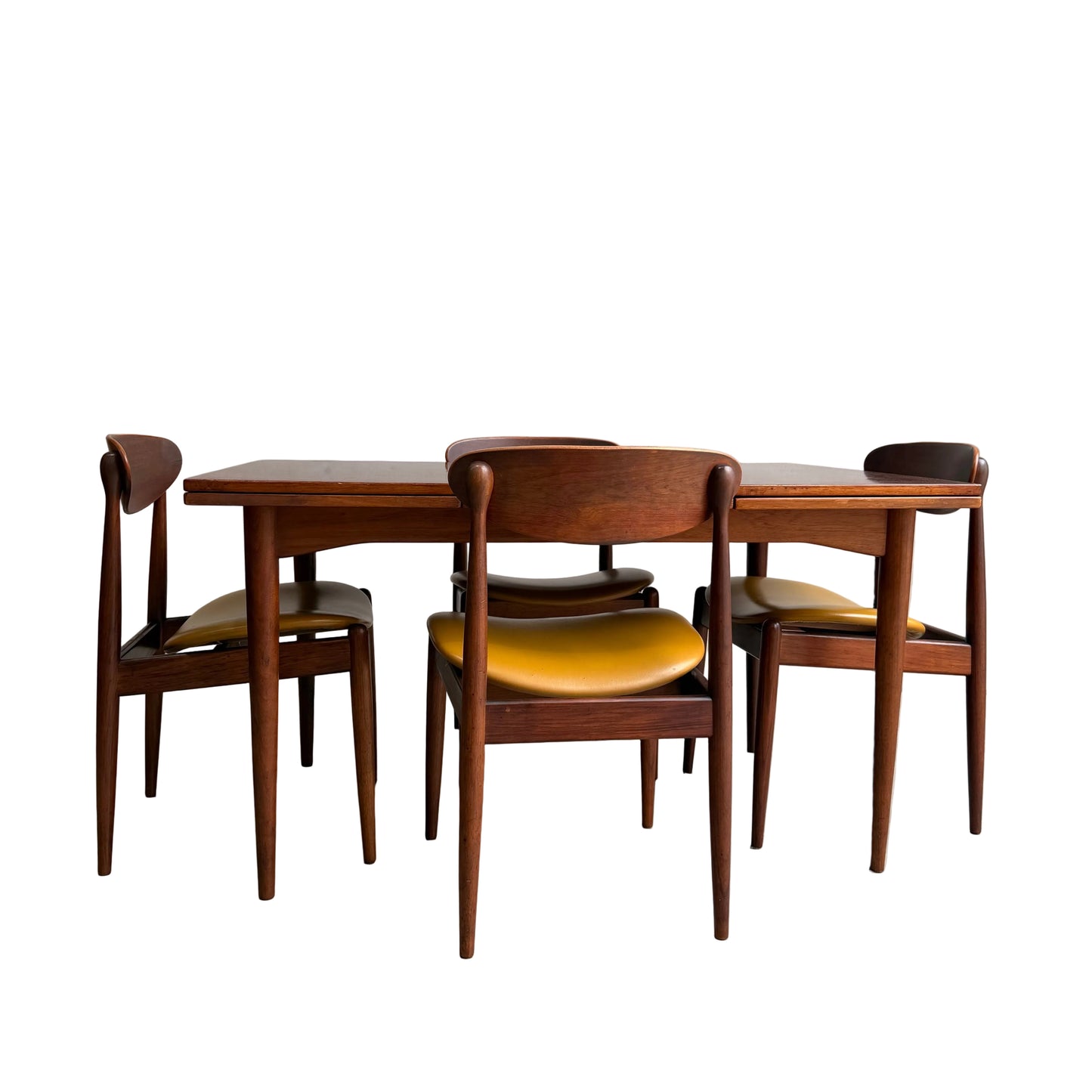A set of 4 Parker 107 Matchstick chairs—curved backs, yellow upholstery—offers vintage Australian style, pictured with a mid-century modern wooden table against a white background. Product: 107 Parker Matchstick chairs set of 4 - COMING SOON.