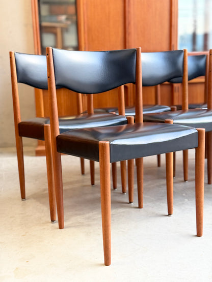 Close-up of rich teak frame and tapered legs on restored Parker No.62 vintage dining chair