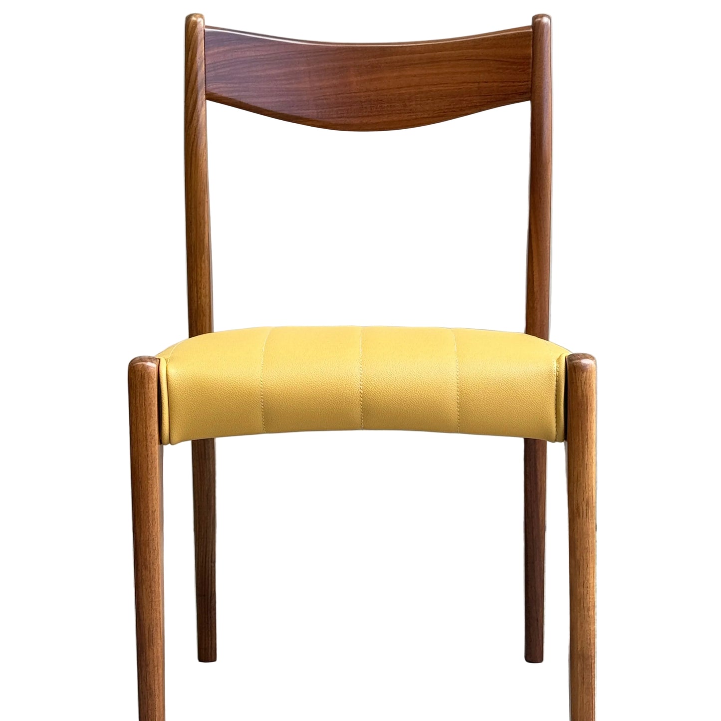 A set of four fully restored THB 'Stockholm' Dining Chairs, featuring curved backrests and padded yellow seats, is arranged on a concrete floor by a light gray wall with a wooden cabinet partially visible on the left.