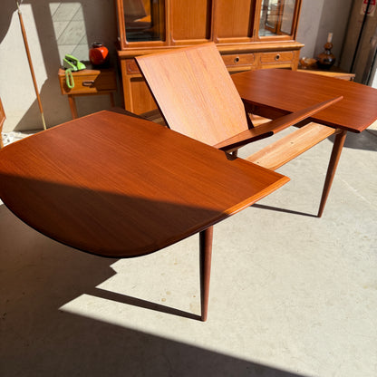 The Fully Restored Parker No.92 D End Dining Table (Rediscover) features a partially opened extending leaf, casting floor shadows, with matching vintage Australian decor and a wooden cabinet in the background.