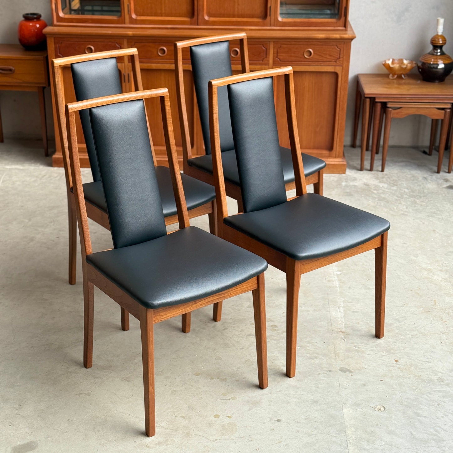 Detail of black vinyl upholstery on restored Noblett Boston mid-century modern dining chair