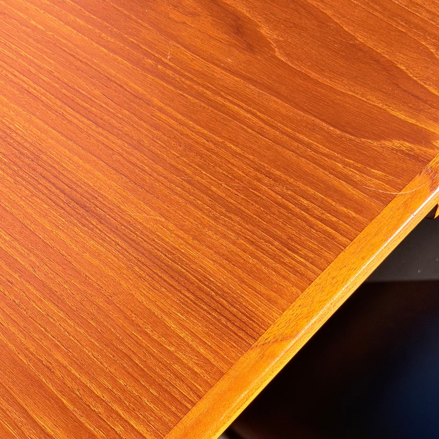 Close-up of the Vintage Parker Dining Suite 5 Piece Square - Number 140, showcasing its smooth, polished wooden surface and rich brown wood grain—a stunning example of Scandinavian-inspired Australian mid-century vintage design.