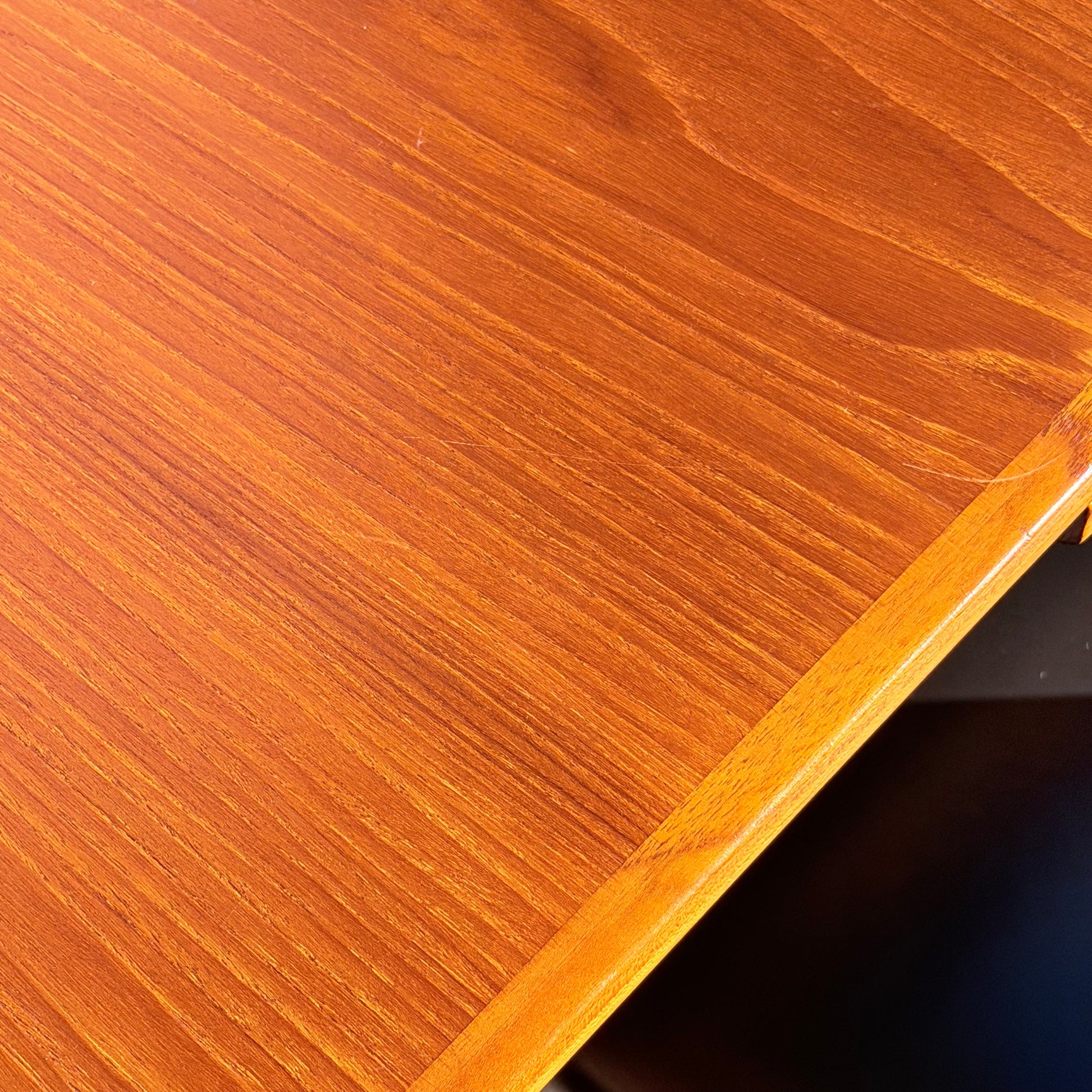 Close-up of the Vintage Parker Dining Suite 5 Piece Square - Number 140, showcasing its smooth, polished wooden surface and rich brown wood grain—a stunning example of Scandinavian-inspired Australian mid-century vintage design.