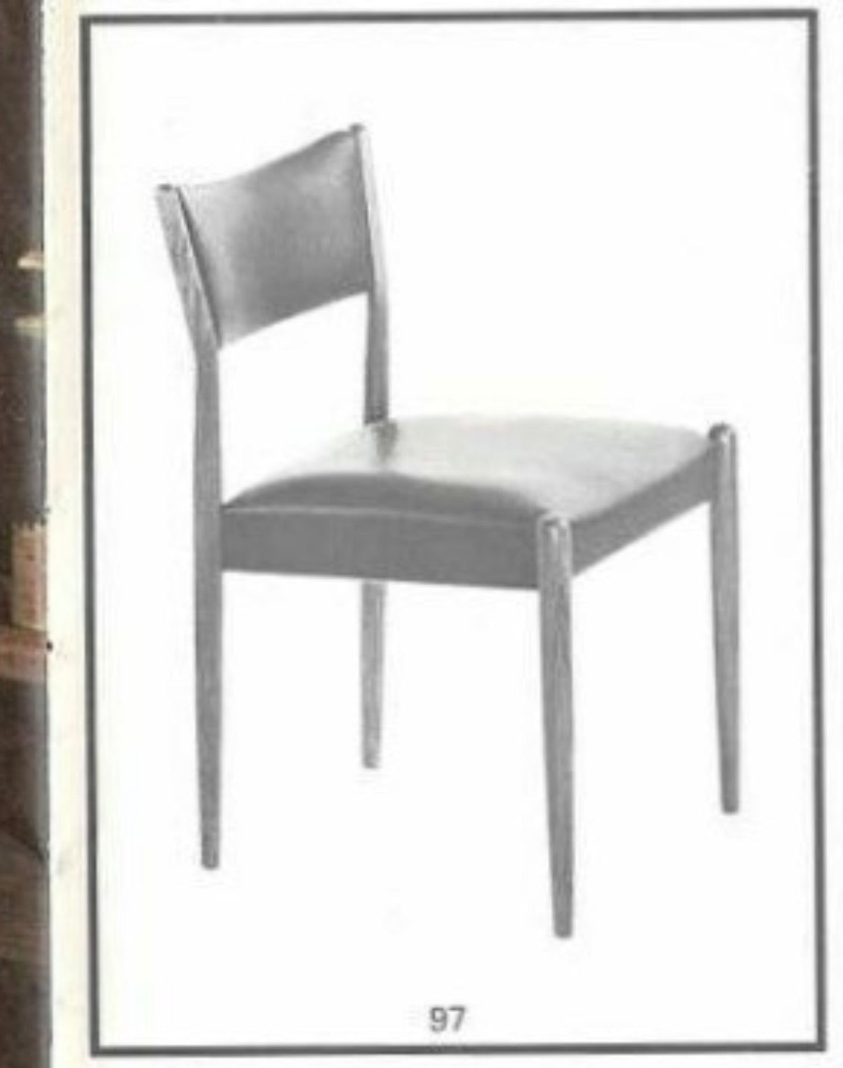 Set of 4 Parker Number 97 Dining Chairs in Licorice Vinyl, featuring a minimalist wooden design with a curved backrest and padded seat for mid-century modern style. The number 97 appears below the chairs against a plain background.