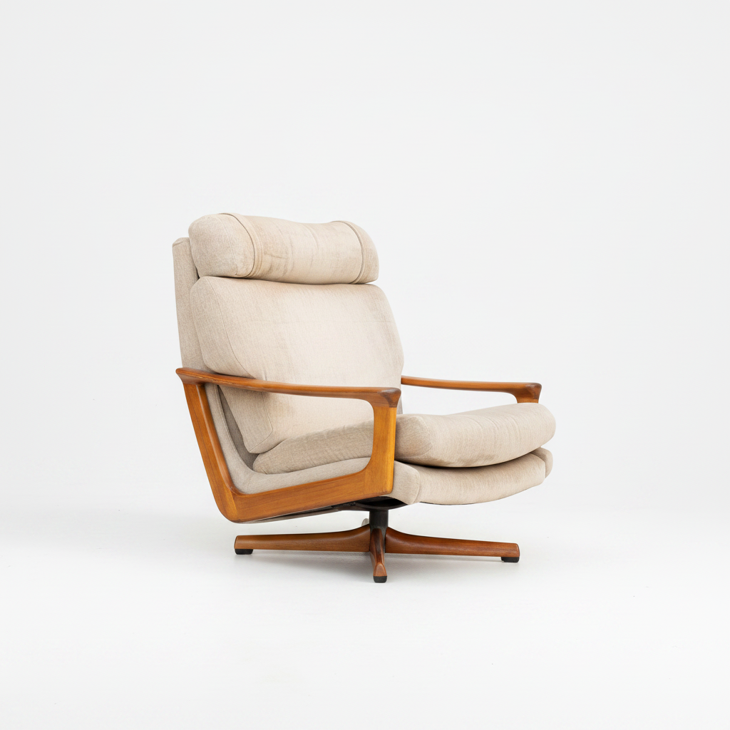 The Vintage Mid Century Tessa T21 Swivel Chair (Revive) features light beige upholstery, plush cushions, a sculpted wooden frame with angled armrests, and a four-star swivel base—all set against a plain gray background.