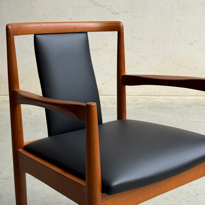 A Pre-Order: Professional Restoration of Parker 89 Chair (25% non-refundable deposit) is shown featuring a sleek black commercial-grade vinyl seat and backrest, minimalist design, and clean lines against a plain light background.