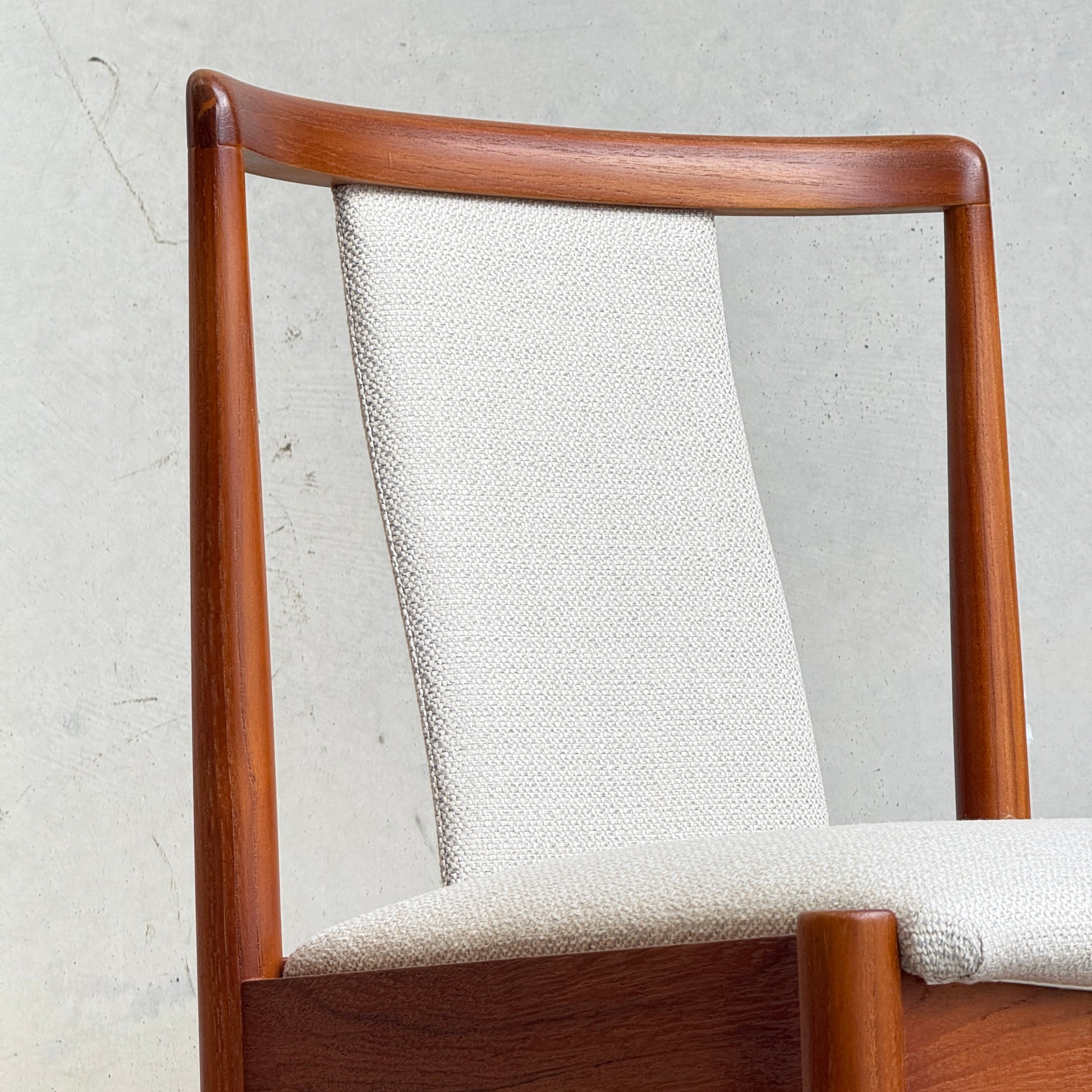 Close-up of solid teak frame and t back on fully restored Parker T-back No.88 dining chair
