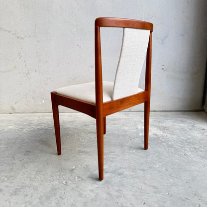 Close-up of Parker T-back Number 88 dining chair highlighting the signature T-shaped backrest and teak frame