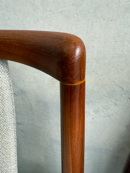 Close-up of T back  on a chair with a light gray background