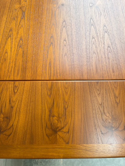 Close-up of a Fully Restored Fler 64 Square Extension Table (Rediscover) with a rich brown finish, prominent grain, and visible seam where sections meet—a classic mid-century modern design by Fred Lowen.